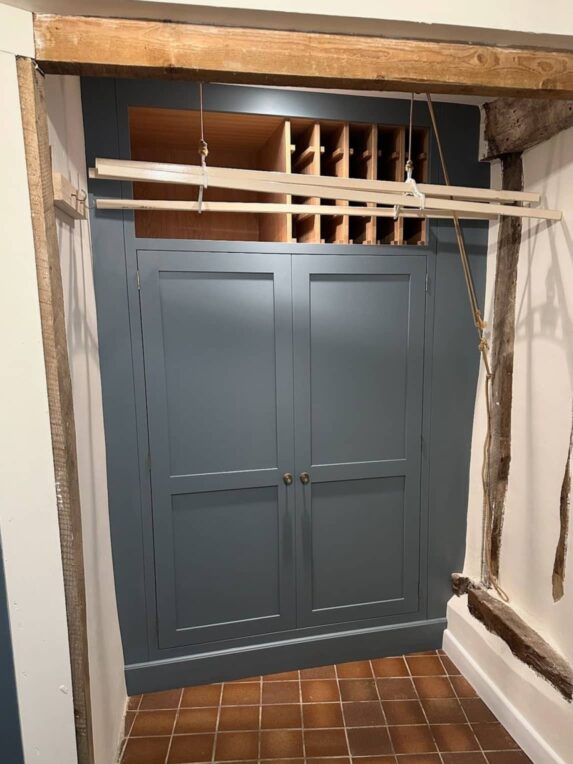 Laundry cabinet with wine rack