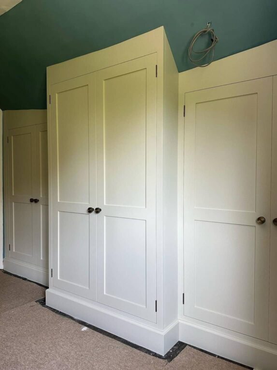 Fitted wardrobes in period property eaves