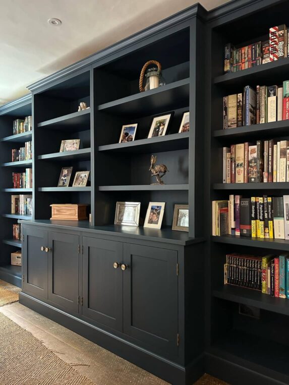 Bookcase with base cabinets and shelving