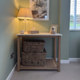 Side table in corner of room